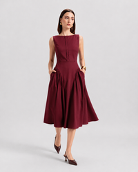 Burgundy sleeveless A-line midi dress with boat neckline and centre front seam detail on bodice