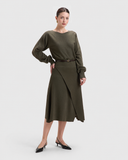 Nawá Green Ribbed Knit Long Sleeve Asymmetrical Midi  Dress styled with thin brown belt