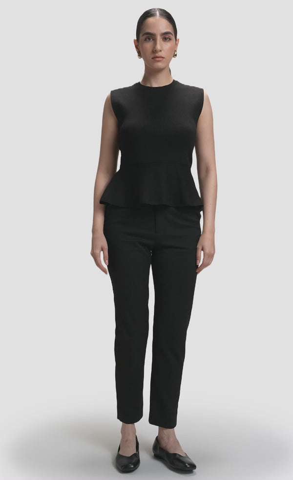 Nawá Black Sleeveless Knit Peplum Hem Top with Delicate Pointelle Detailing - video